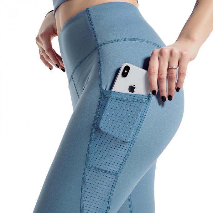 Pantalones apretados de la yoga de las mujeres del desgaste del gimnasio de las polainas de la aptitud atractiva de la cintura alta con desgaste atlético del gimnasio del extremo del arrugado del activewear de los bolsillos
