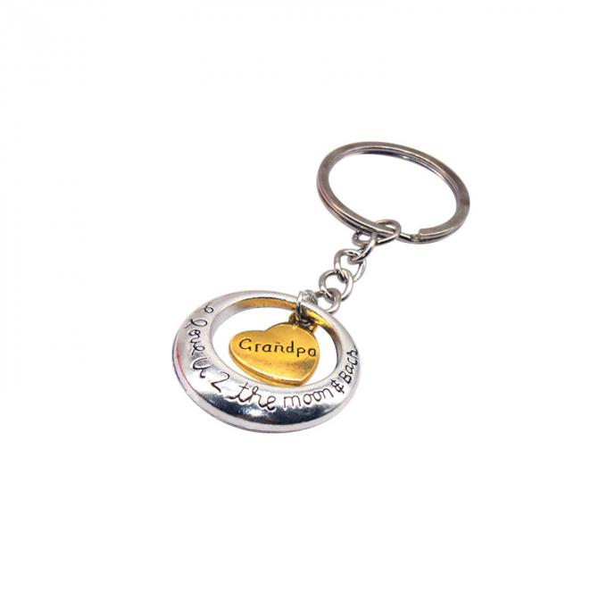 la aduana vende al por mayor el nuevo metal precioso creativo de la aleación del cinc del regalo del coche de la forma del corazón keychian