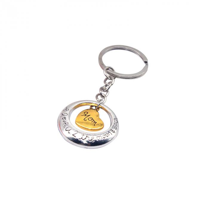 la aduana vende al por mayor el nuevo metal precioso creativo de la aleación del cinc del regalo del coche de la forma del corazón keychian