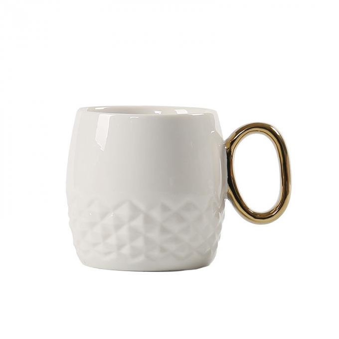 El café de cerámica divertido asalta la piña de la porcelana forma las tazas blancas negras de la taza con oro maneja el recuerdo promocional plateado del viaje